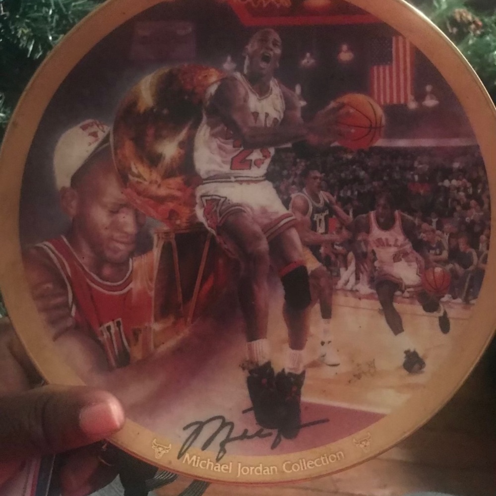 Autographed Michael Jordan 1st Championship plate.